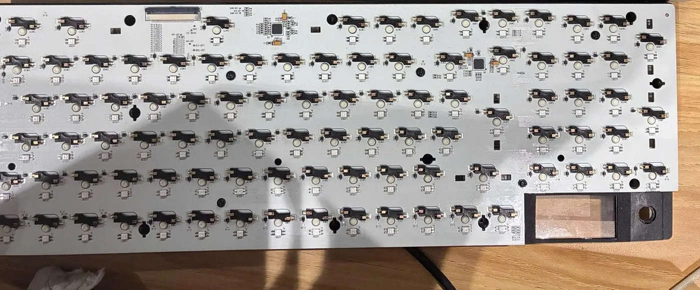 Per-key switch and LED matrix with an integrated display cut-out